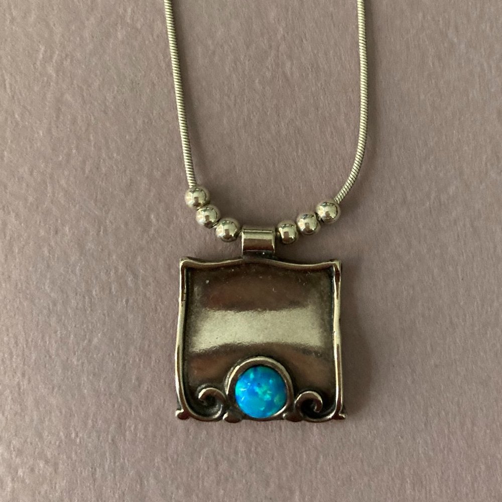 Silver pendant with small opal on a 16"chain